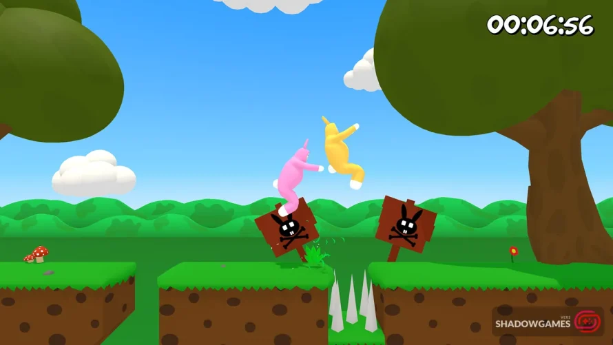 دو خرگوش پوش حین پرش از روی چاله میخ دار در بازی آنلاین Super Bunny Man